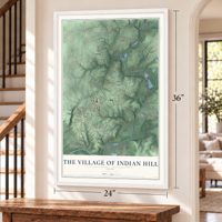 The Village of Indian Hill, Ohio map, 24 x 36 inch print in a white frame by a staircase