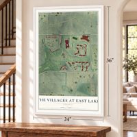 The Villages at East Lake, Georgia map, 24 x 36 inch print in a white frame by a staircase