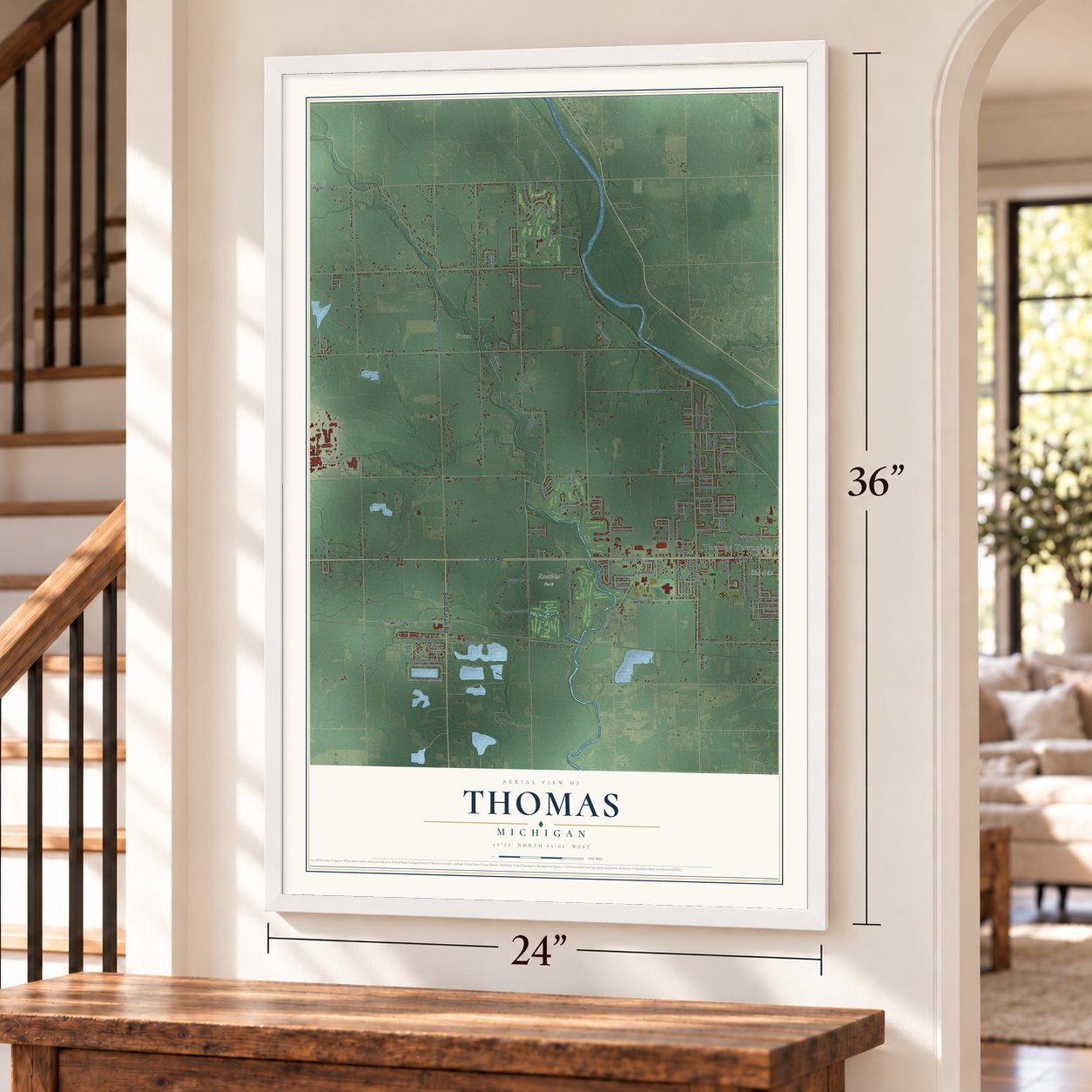 Thomas, Michigan map, 24 x 36 inch print in a white frame by a staircase