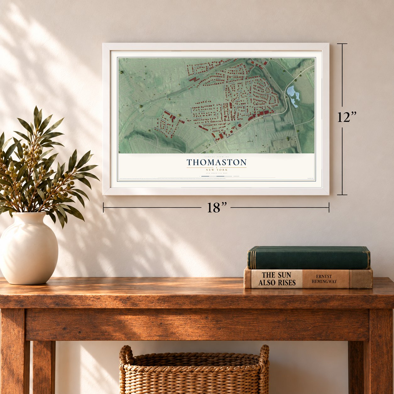 Thomaston, New York map, 12 x 18 inch print in a white frame in an entryway