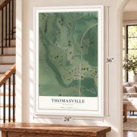 Thomasville, Missouri map, 24 x 36 inch print in a white frame by a staircase
