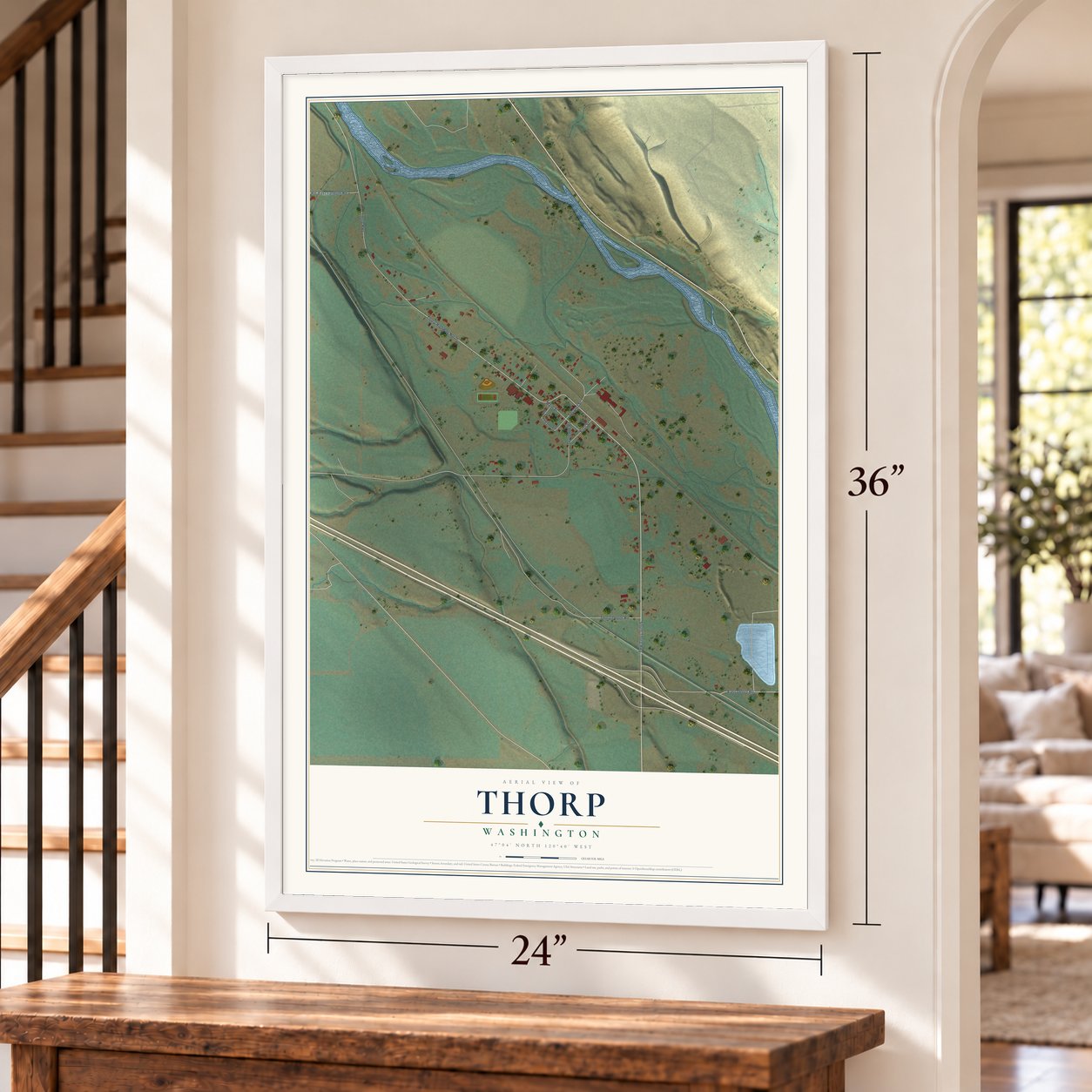 Thorp, Washington map, 24 x 36 inch print in a white frame by a staircase