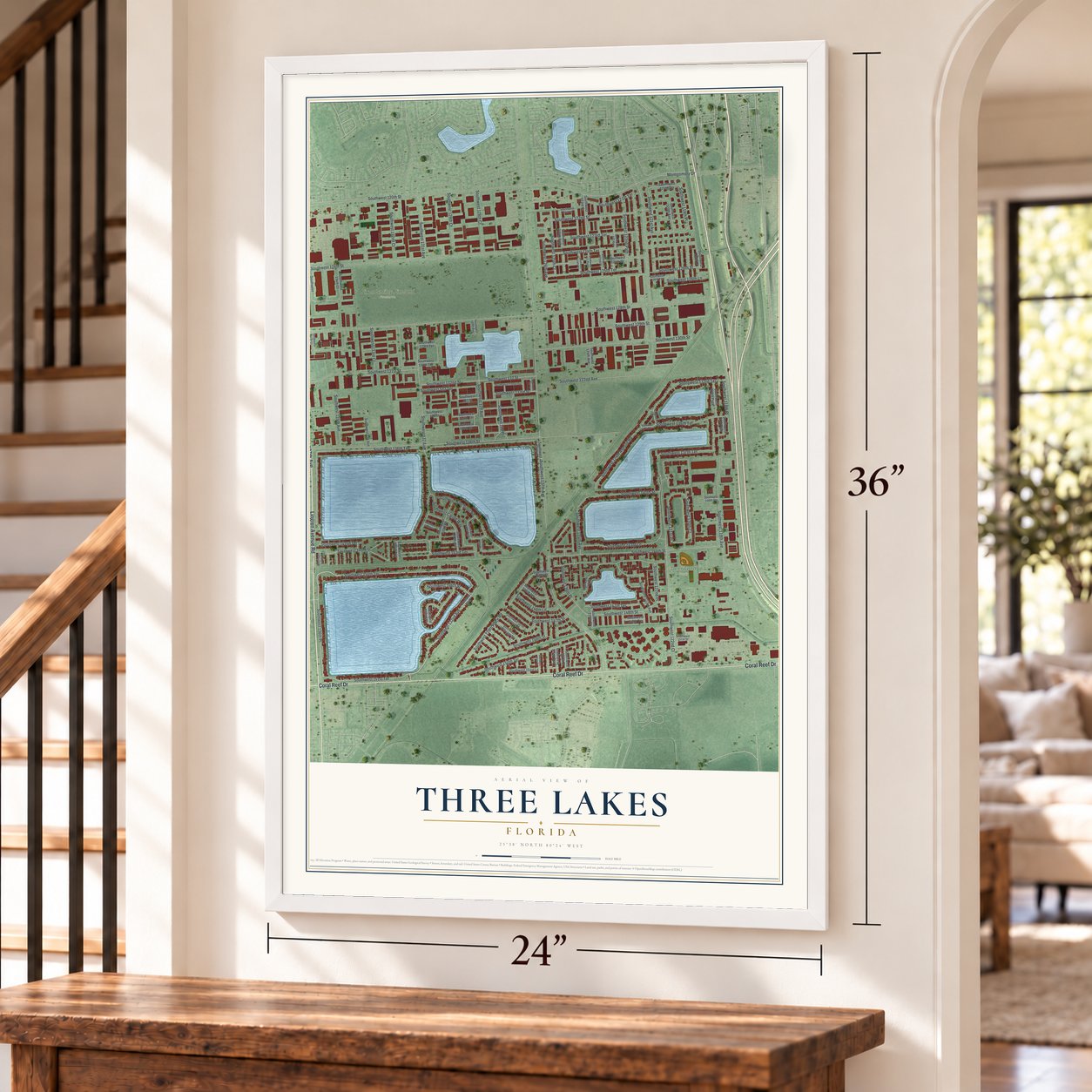 Three Lakes, Florida map, 24 x 36 inch print in a white frame by a staircase