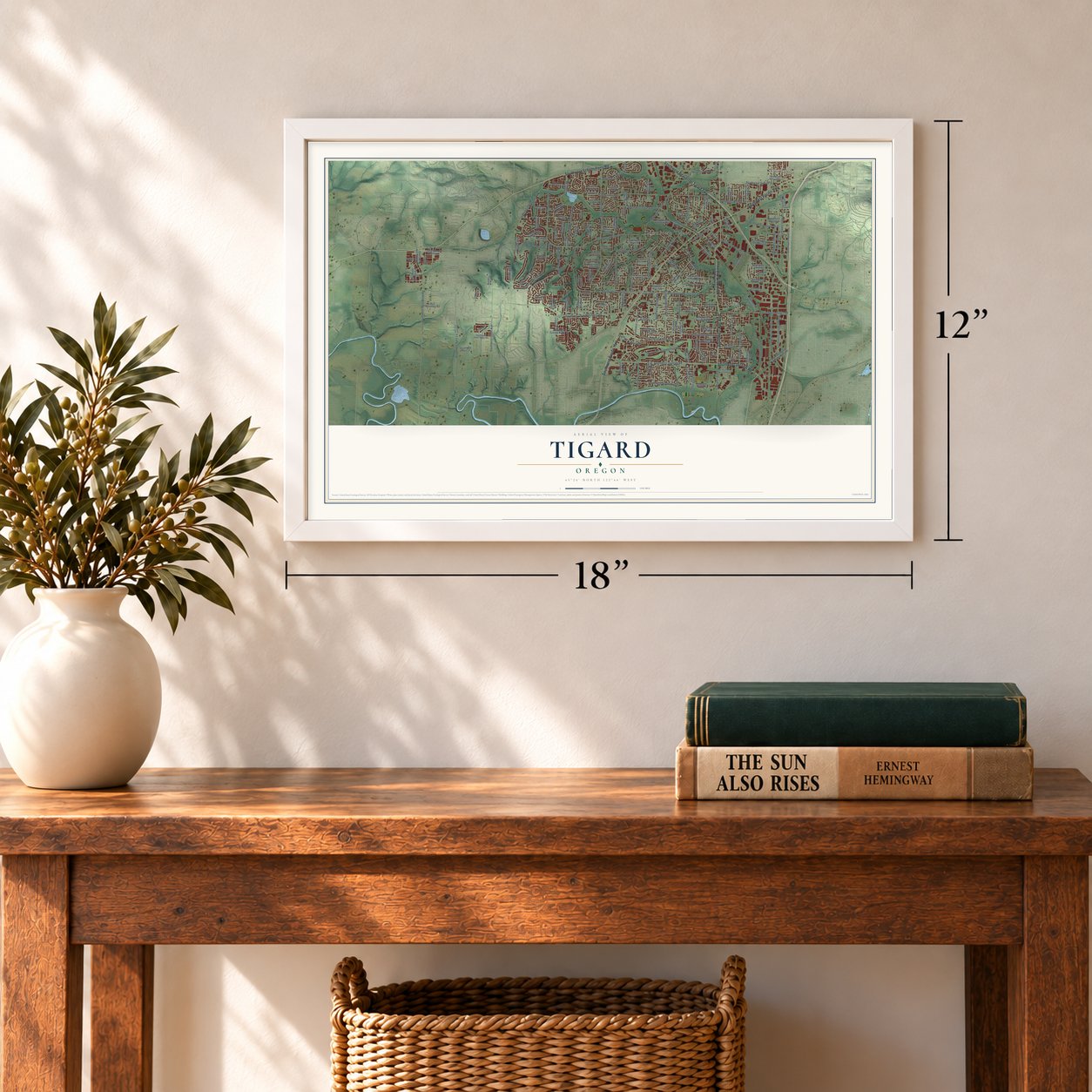 Tigard, Oregon map, 12 x 18 inch print in a white frame in an entryway