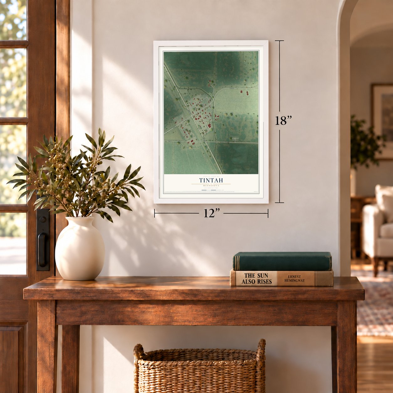 Tintah, Minnesota map, 12 x 18 inch print in a white frame in an entryway
