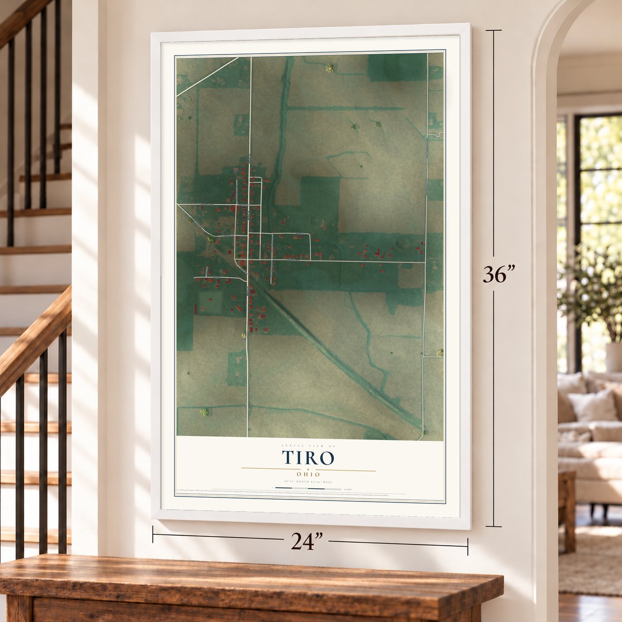 Tiro, Ohio map, 24 x 36 inch print in a white frame by a staircase