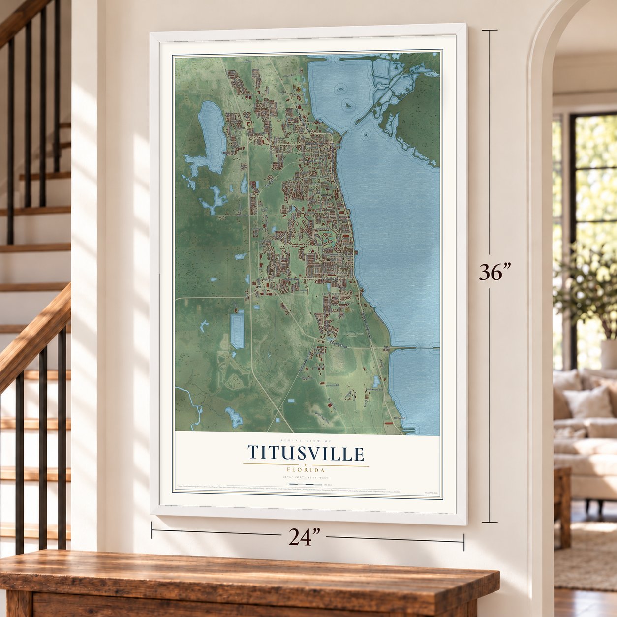 Titusville, Florida map, 24 x 36 inch print in a white frame by a staircase