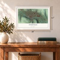Titusville, Pennsylvania map, 12 x 18 inch print in a white frame in an entryway