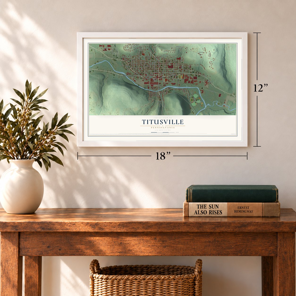 Titusville, Pennsylvania map, 12 x 18 inch print in a white frame in an entryway
