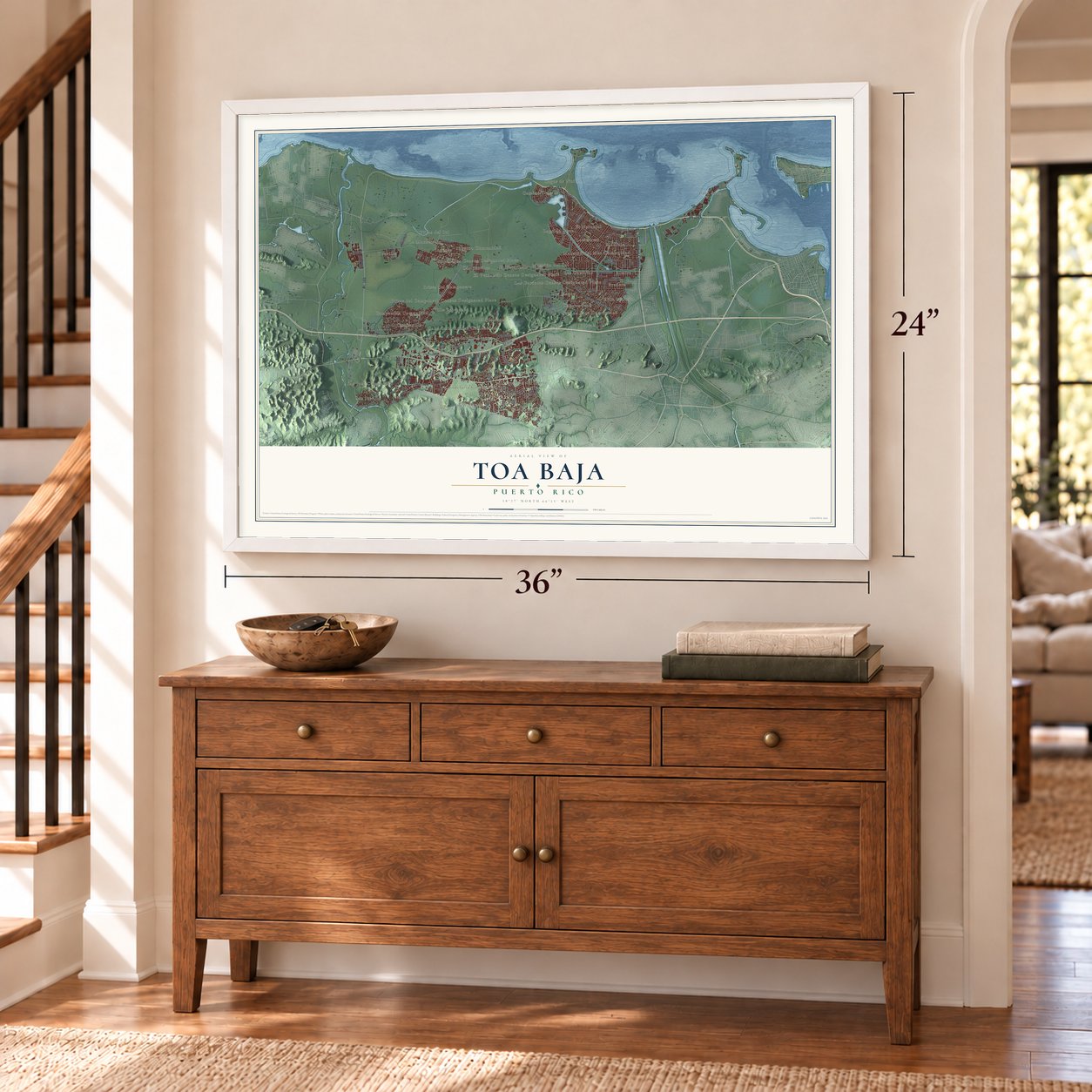 Toa Baja, Puerto Rico map, 24 x 36 inch print in a white frame above a dresser by a staircase
