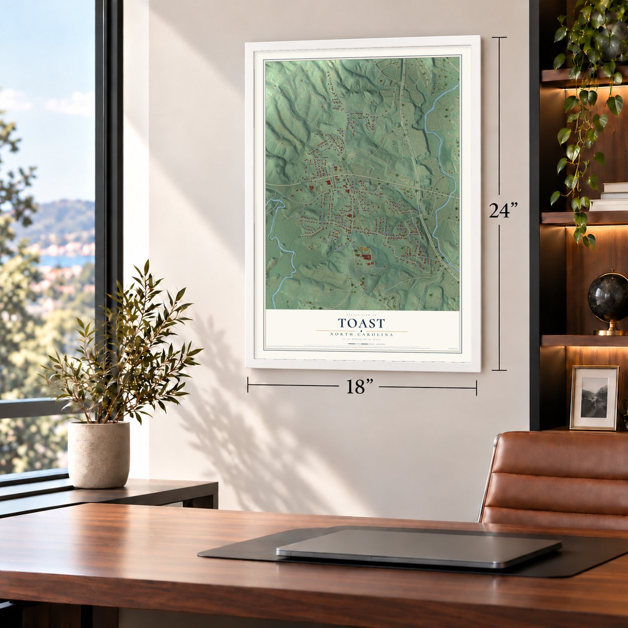 Toast, North Carolina map, 18 x 24 inch print in a white frame in a home office