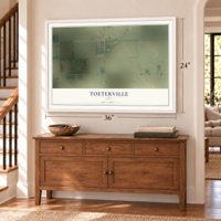 Toeterville, Iowa map, 24 x 36 inch print in a white frame above a dresser by a staircase