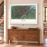 Toledo, Ohio map, 24 x 36 inch print in a white frame above a dresser by a staircase