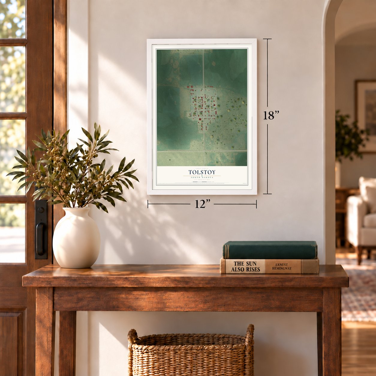 Tolstoy, South Dakota map, 12 x 18 inch print in a white frame in an entryway