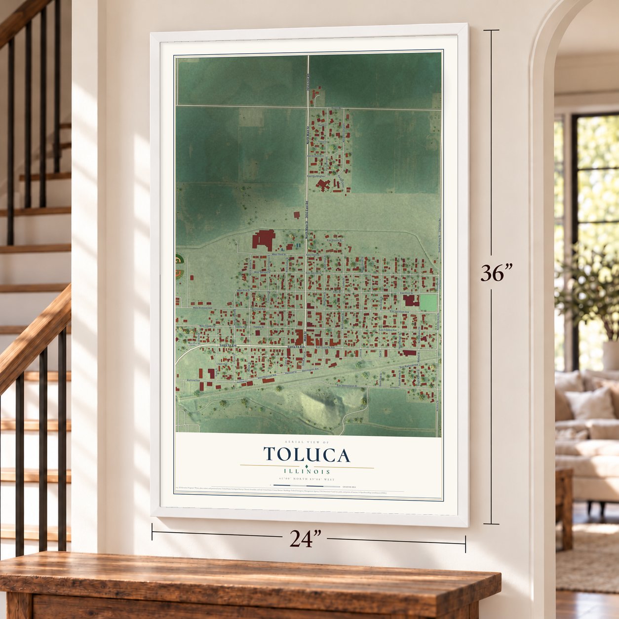 Toluca, Illinois map, 24 x 36 inch print in a white frame by a staircase