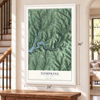 Tompkins, New York map, 24 x 36 inch print in a white frame by a staircase
