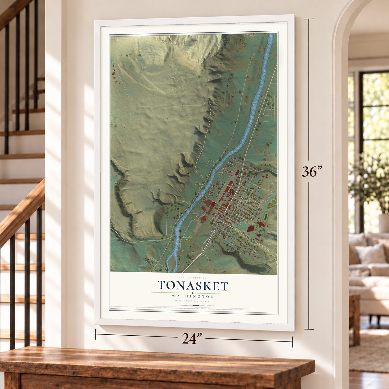 Tonasket, Washington map, 24 x 36 inch print in a white frame by a staircase