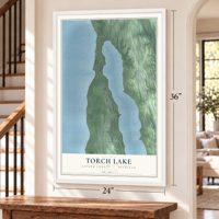 Torch Lake, Antrim County, Michigan map, 24 x 36 inch print in a white frame by a staircase