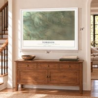 Torreon, New Mexico map, 24 x 36 inch print in a white frame above a dresser by a staircase