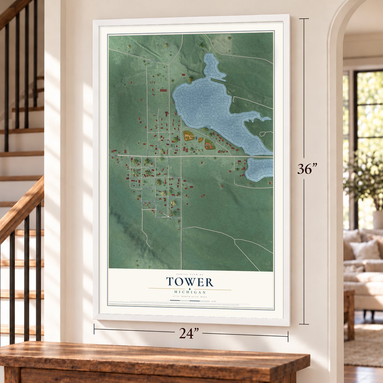 Tower, Michigan map, 24 x 36 inch print in a white frame by a staircase