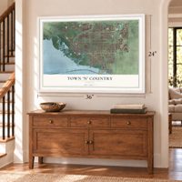 Town 'n' Country, Florida map, 24 x 36 inch print in a white frame above a dresser by a staircase