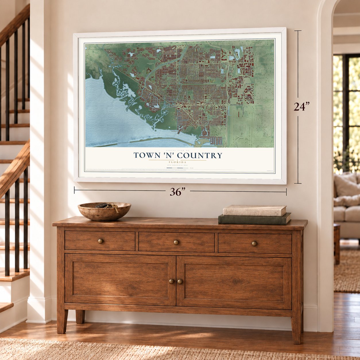 Town 'n' Country, Florida map, 24 x 36 inch print in a white frame above a dresser by a staircase