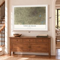 Town of Pecos, Texas map, 24 x 36 inch print in a white frame above a dresser by a staircase