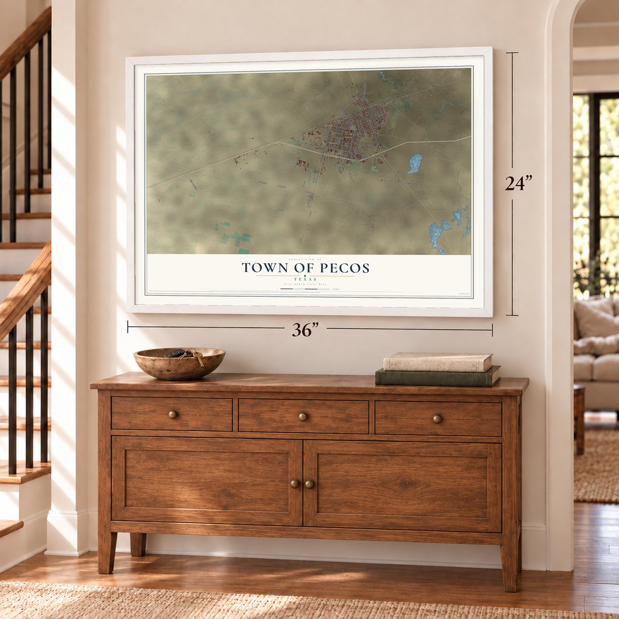 Town of Pecos, Texas map, 24 x 36 inch print in a white frame above a dresser by a staircase