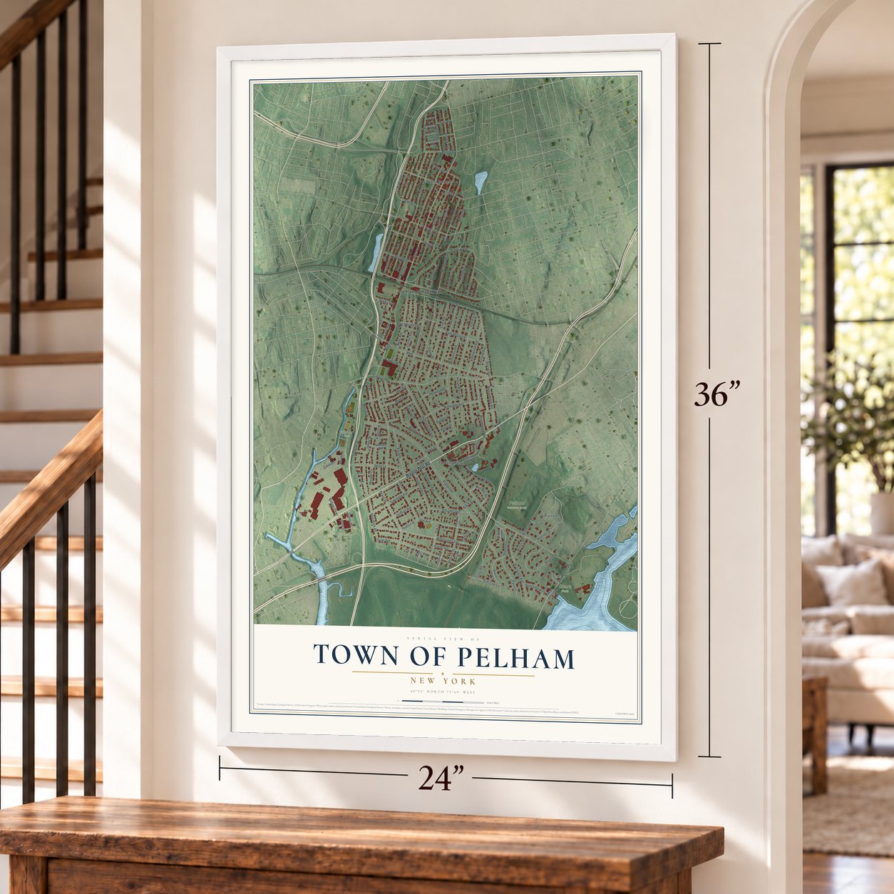 Town of Pelham, New York map, 24 x 36 inch print in a white frame by a staircase