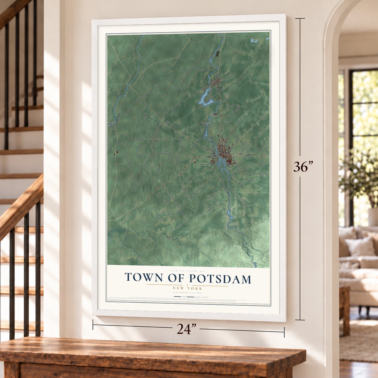 Town of Potsdam, New York map, 24 x 36 inch print in a white frame by a staircase
