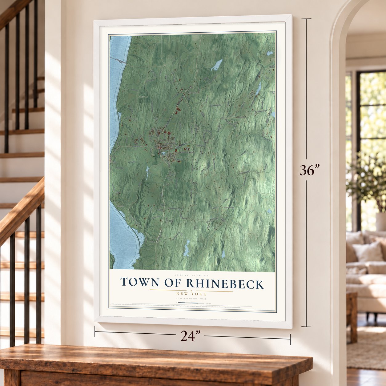 Town of Rhinebeck, New York map, 24 x 36 inch print in a white frame by a staircase