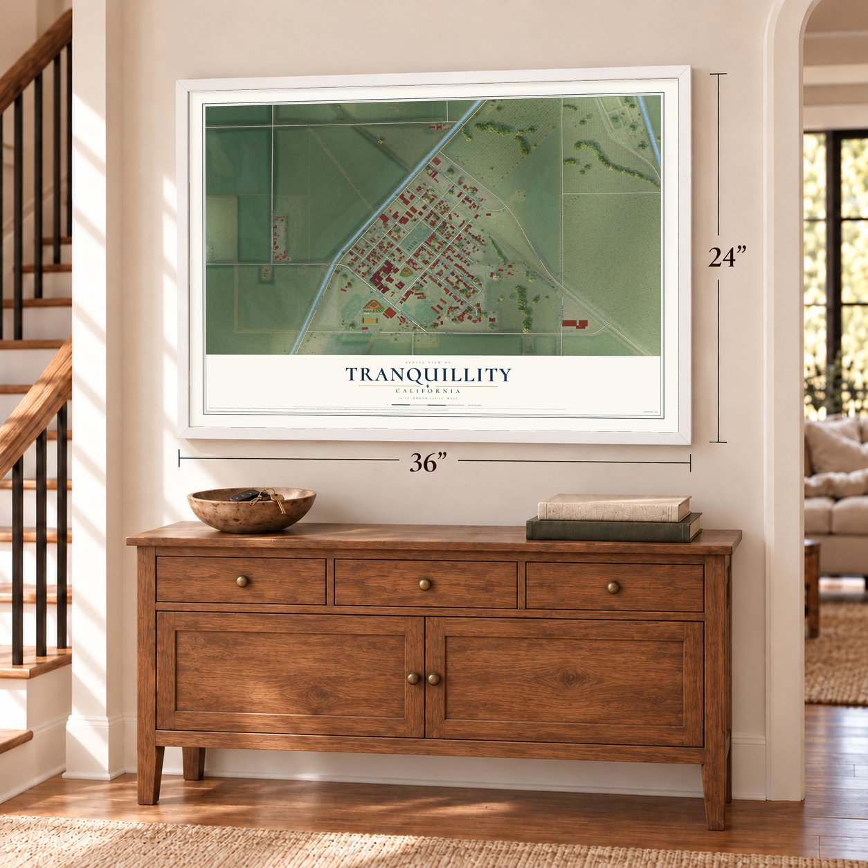 Tranquillity, California map, 24 x 36 inch print in a white frame above a dresser by a staircase