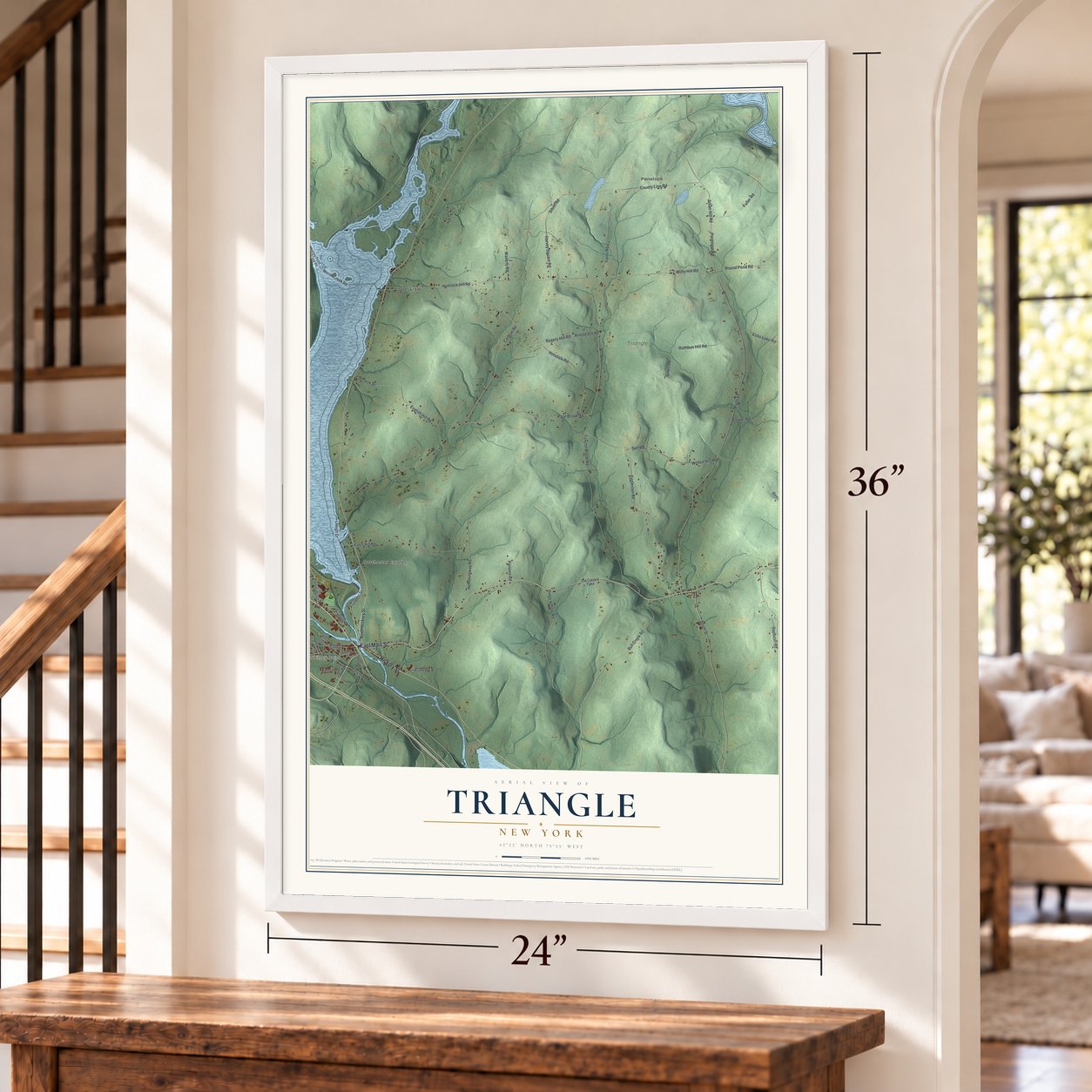 Triangle, New York map, 24 x 36 inch print in a white frame by a staircase