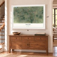 Trilby, Florida map, 24 x 36 inch print in a white frame above a dresser by a staircase