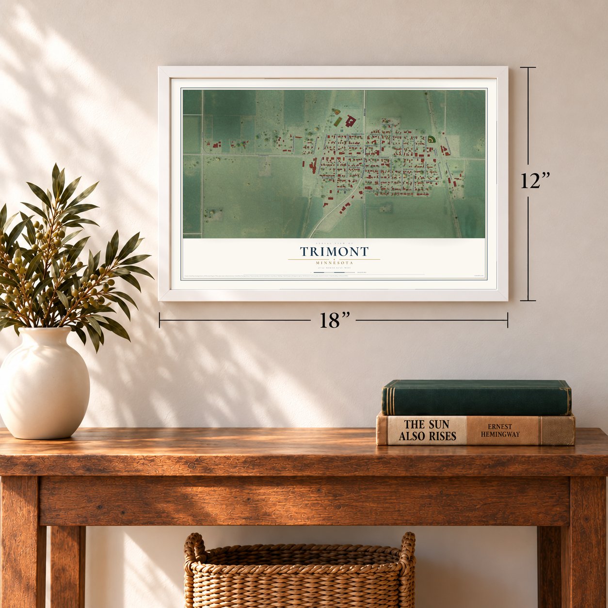 Trimont, Minnesota map, 12 x 18 inch print in a white frame in an entryway