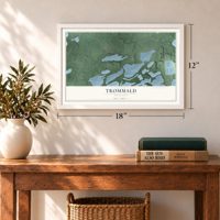Trommald, Minnesota map, 12 x 18 inch print in a white frame in an entryway