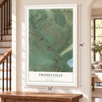 Troxelville, Pennsylvania map, 24 x 36 inch print in a white frame by a staircase
