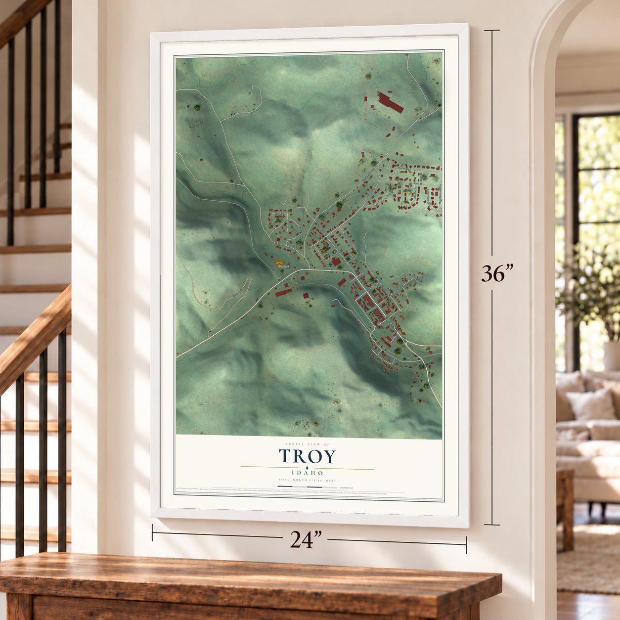 Troy, Idaho map, 24 x 36 inch print in a white frame by a staircase
