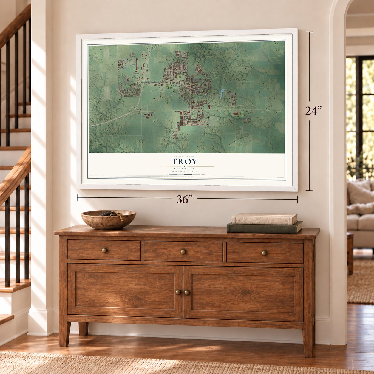 Troy, Illinois map, 24 x 36 inch print in a white frame above a dresser by a staircase