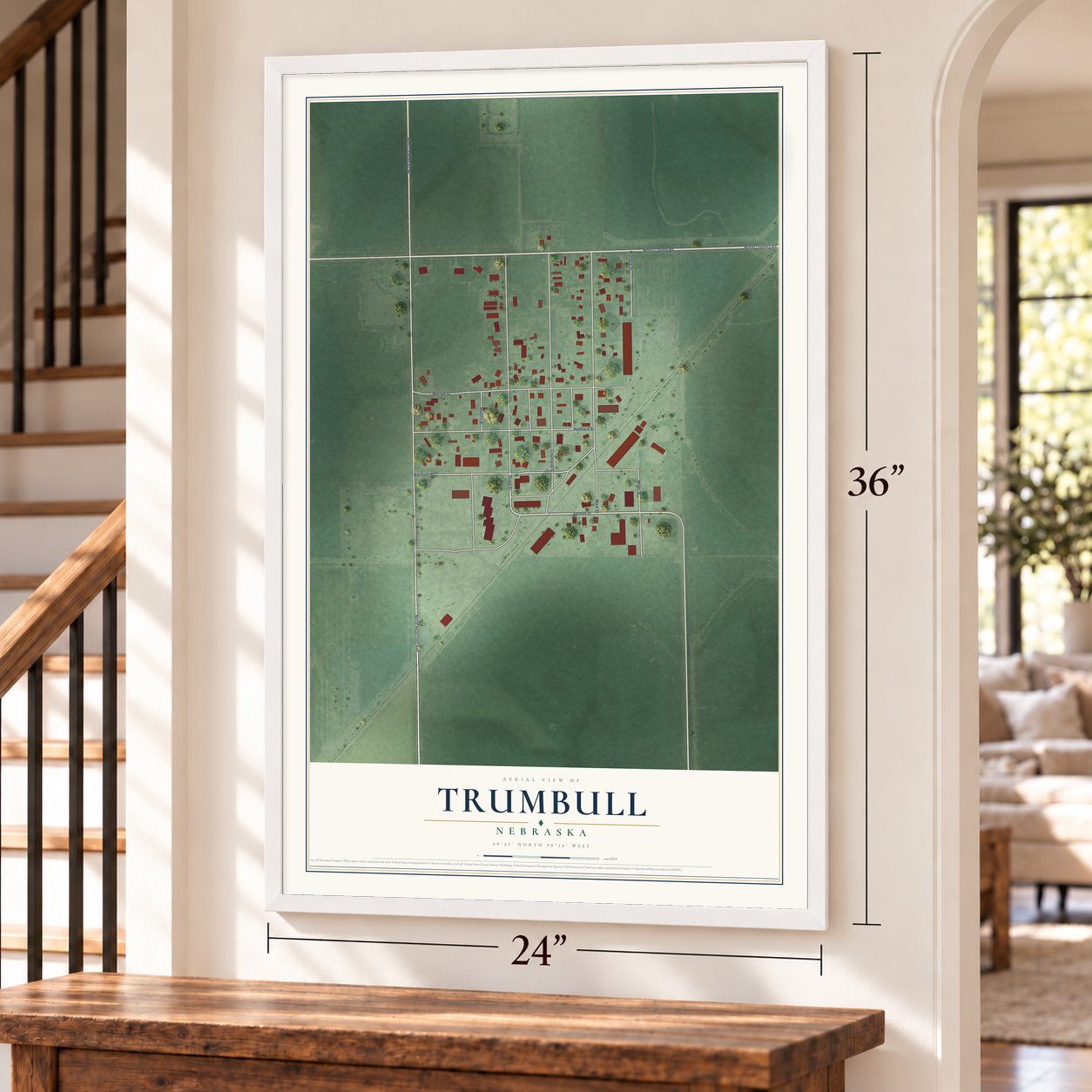 Trumbull, Nebraska map, 24 x 36 inch print in a white frame by a staircase