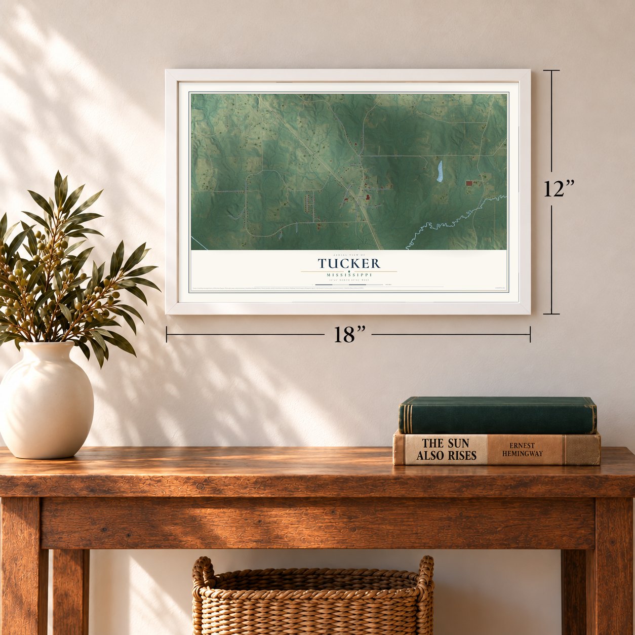 Tucker, Mississippi map, 12 x 18 inch print in a white frame in an entryway