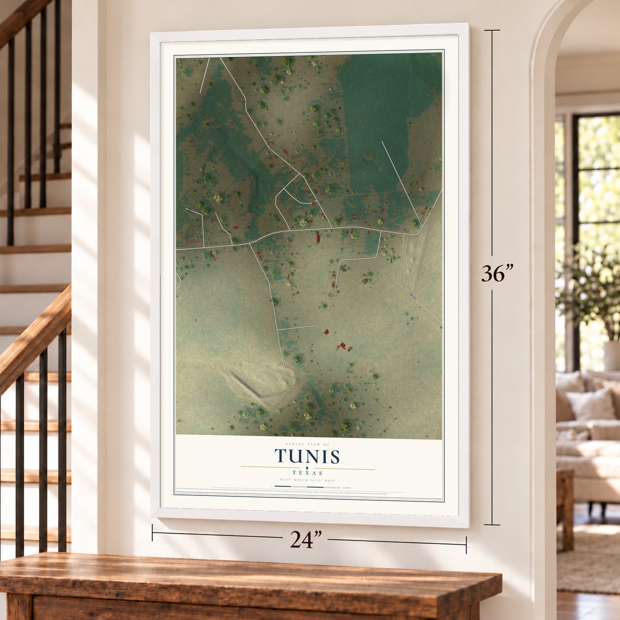 Tunis, Texas map, 24 x 36 inch print in a white frame by a staircase