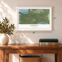 Tununak, Alaska map, 12 x 18 inch print in a white frame in an entryway