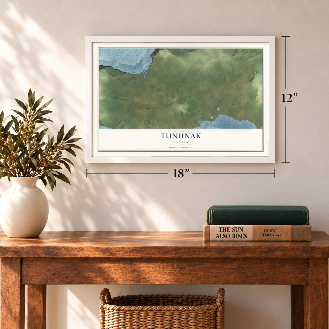 Tununak, Alaska map, 12 x 18 inch print in a white frame in an entryway