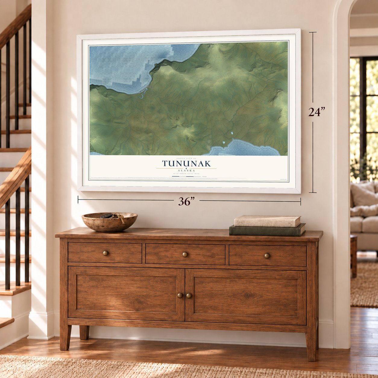 Tununak, Alaska map, 24 x 36 inch print in a white frame above a dresser by a staircase