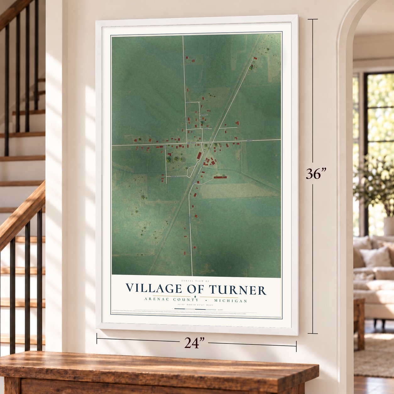 Turner, Michigan map, 24 x 36 inch print in a white frame by a staircase