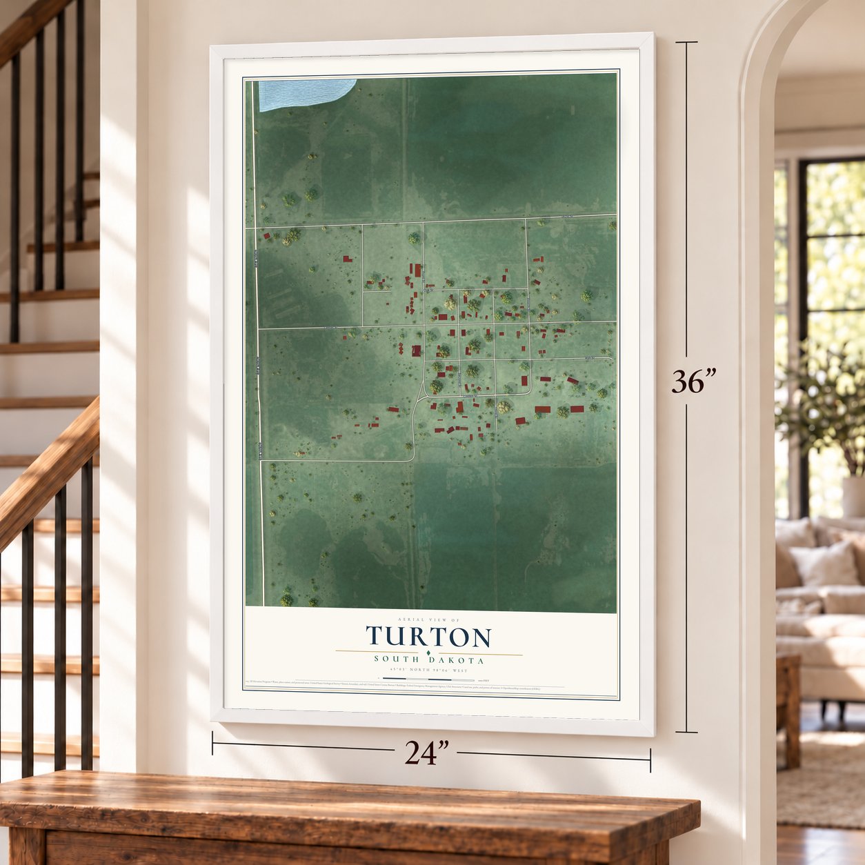 Turton, South Dakota map, 24 x 36 inch print in a white frame by a staircase
