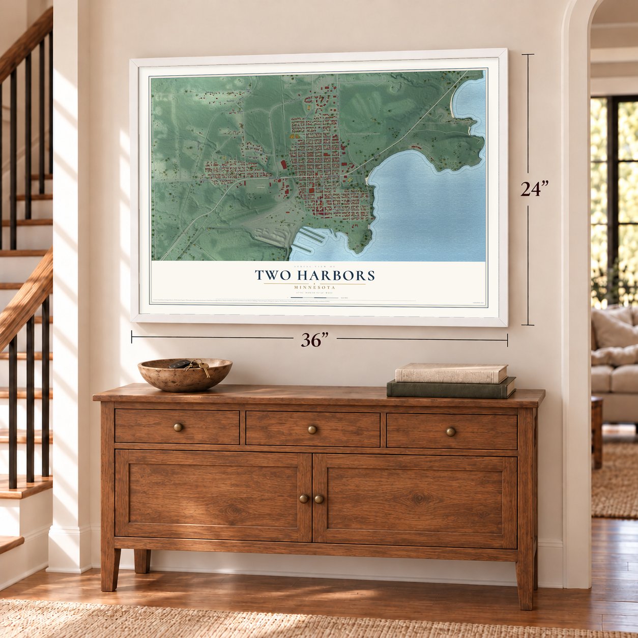 Two Harbors, Minnesota map, 24 x 36 inch print in a white frame above a dresser by a staircase