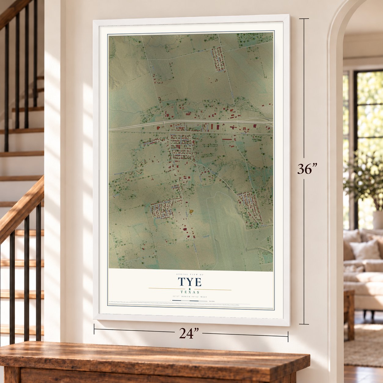 Tye, Texas map, 24 x 36 inch print in a white frame by a staircase
