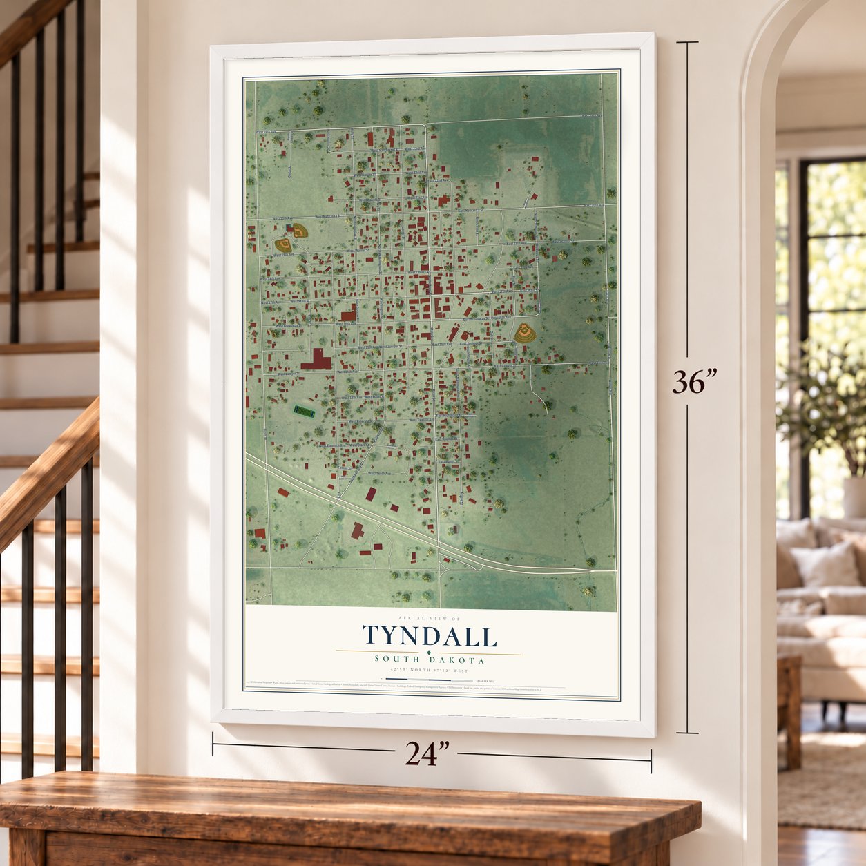 Tyndall, South Dakota map, 24 x 36 inch print in a white frame by a staircase